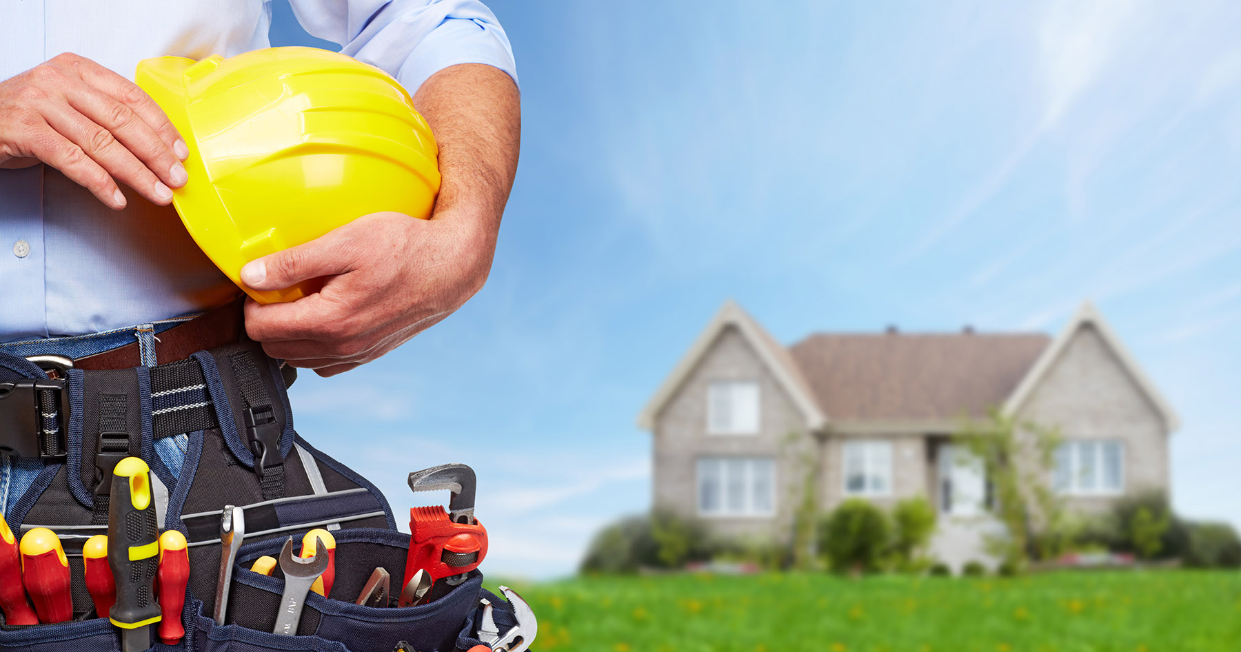 Builder handyman with construction tools.