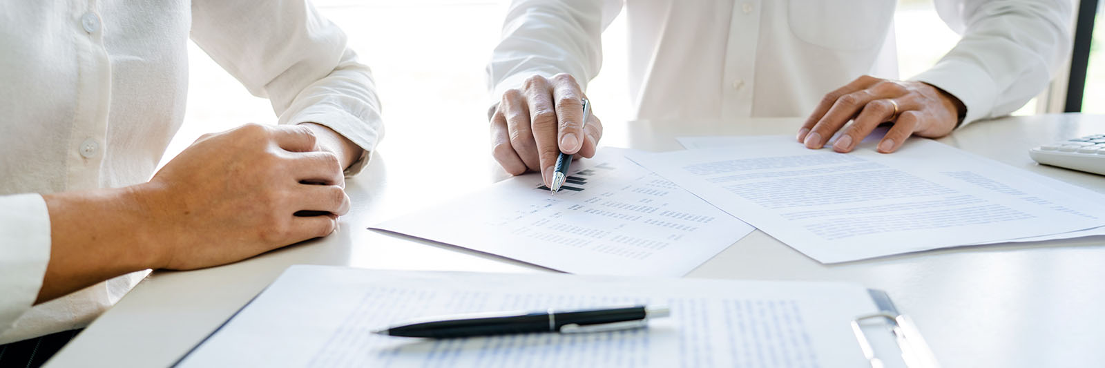 Real Estate Agent broker or House developer showing contract for